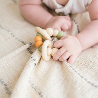 Savannah Baby Gift Bundle | Ring Pop Rattle in Leopard Cream | Trio Freezer Teether in Mango Tango | Savannah Baby Wrap Swaddle